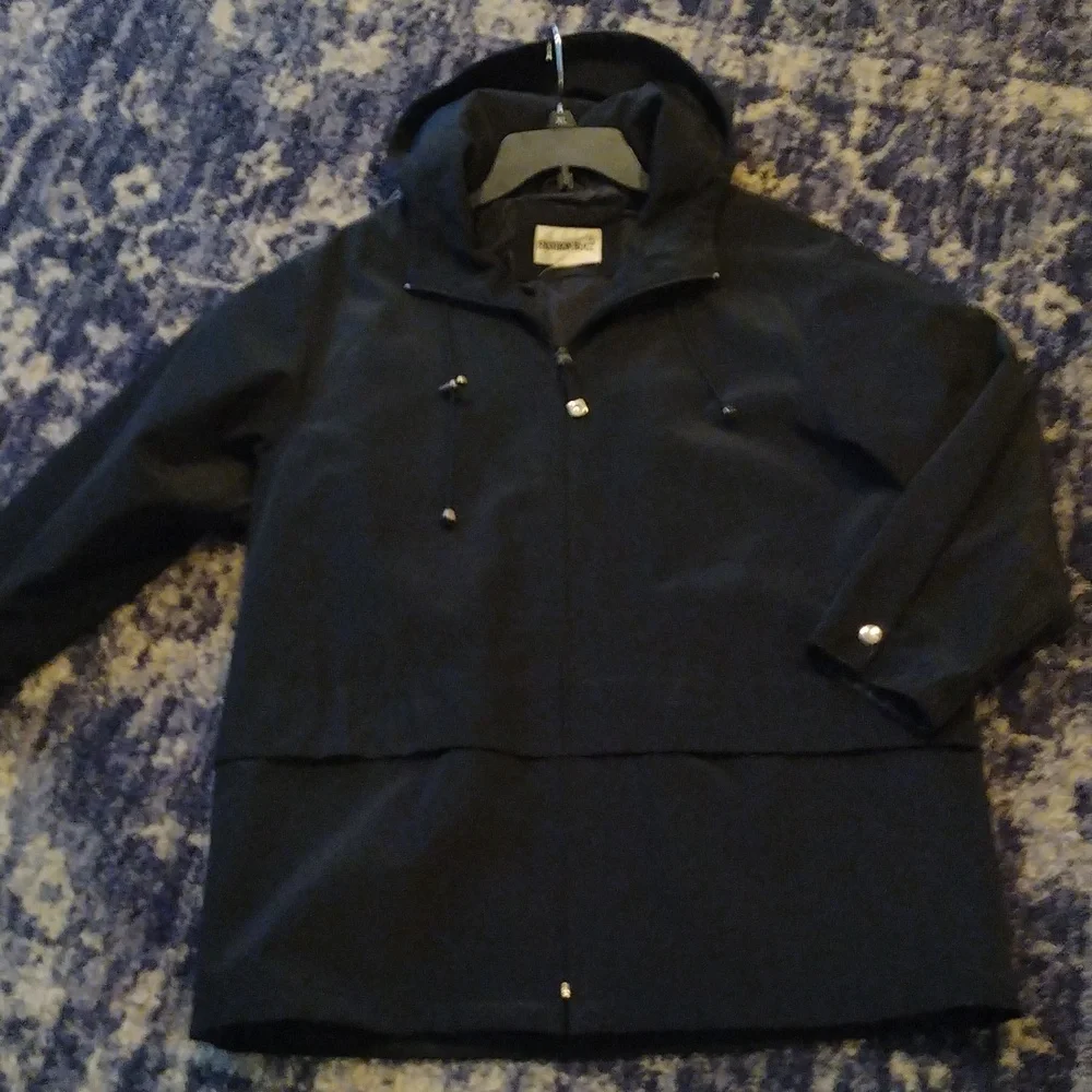 -Black water resistant flap front pockets snap cuffs hooded zip up raincoat